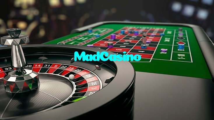MadCasino casino presented on mobile device in Pakistan with slots and live games
